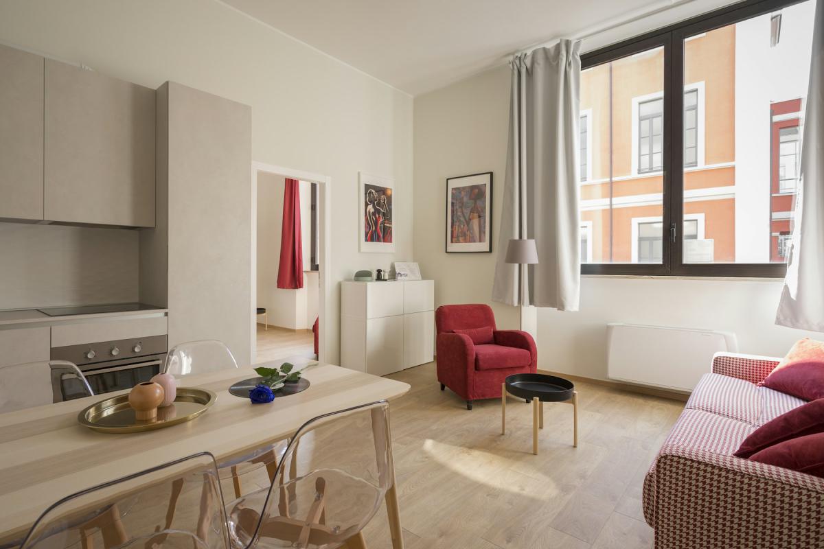 Bright apartment interior design with open living and dining area