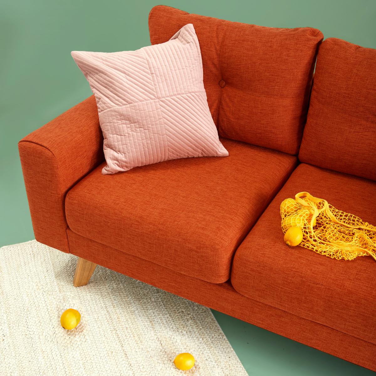 Custom furniture design detail of a tailored upholstered sofa